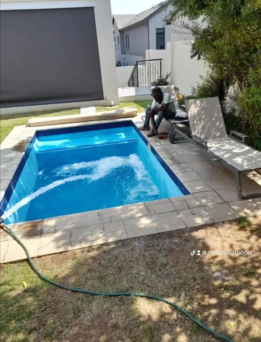 Before: pool being filled with water for the first time